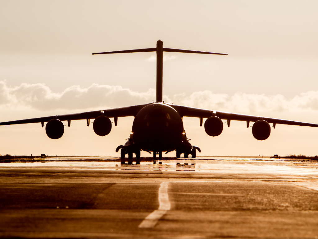 aereospace products testing with military bomber on tarmac
